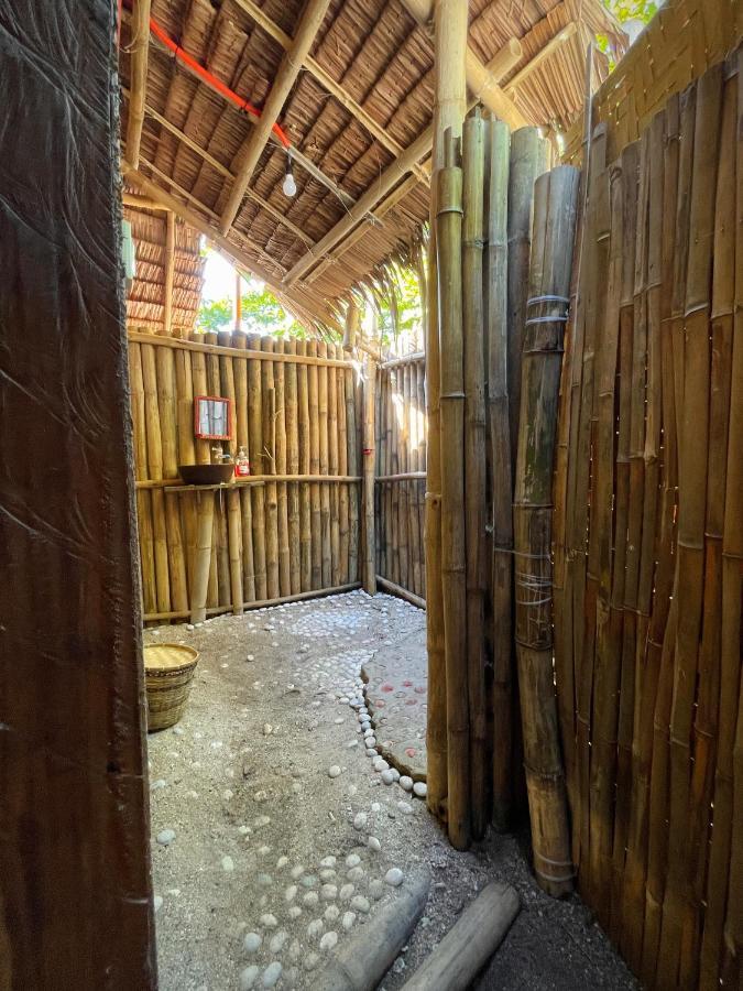 Tribal Huts Community Hostel Daanbantayan Cameră foto
