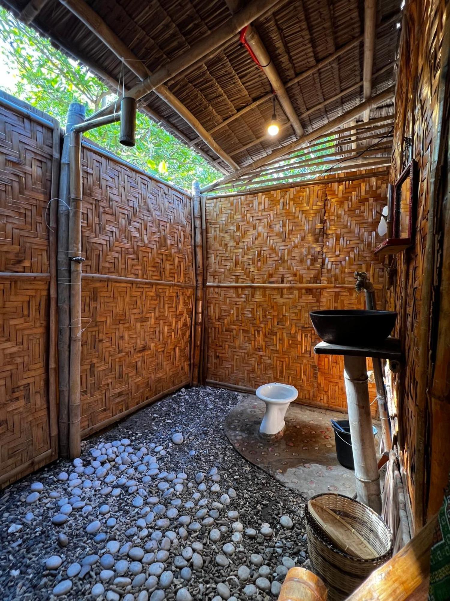 Tribal Huts Community Hostel Daanbantayan Cameră foto