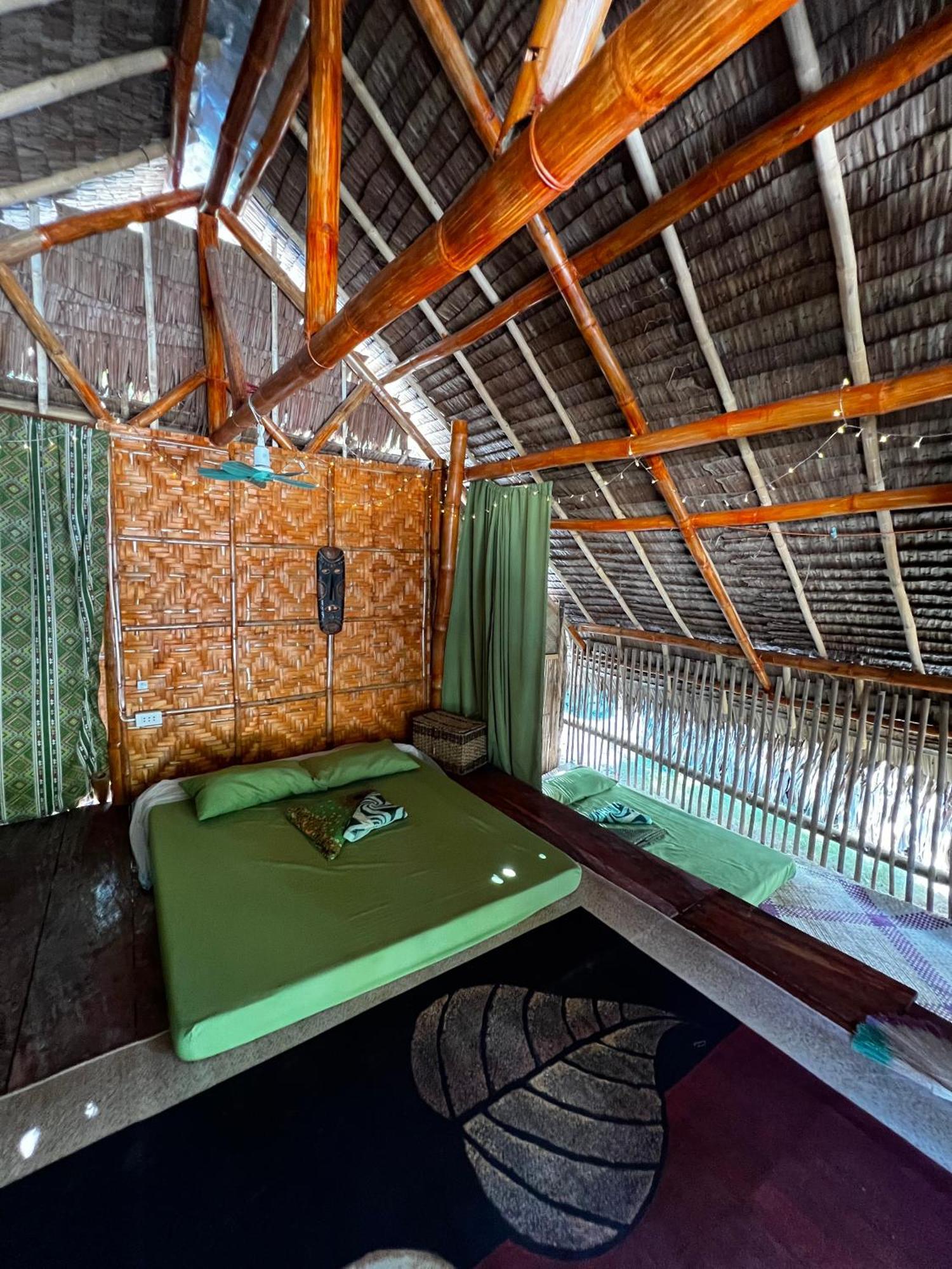 Tribal Huts Community Hostel Daanbantayan Cameră foto